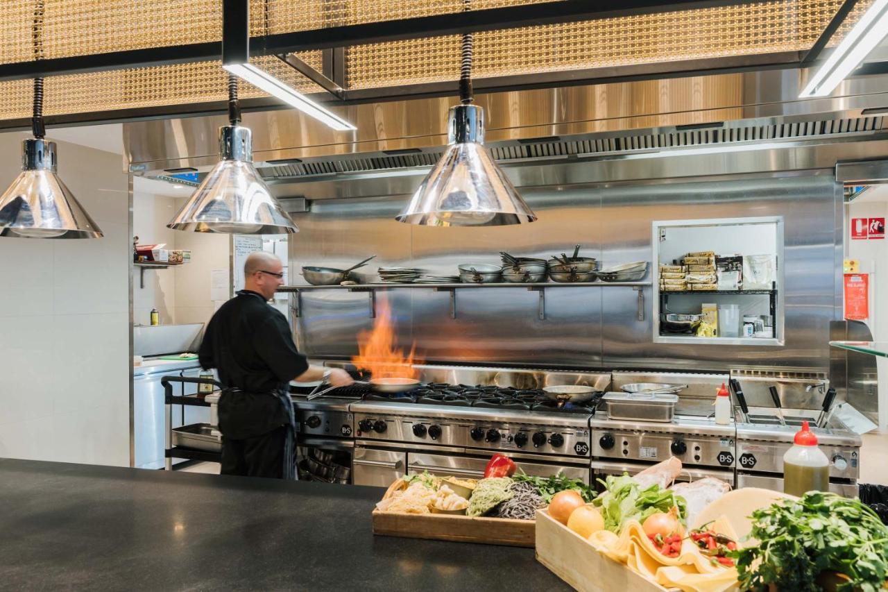 Peppers Waymouth Hotel Adelaide Exteriör bild A chef working in a restaurant kitchen