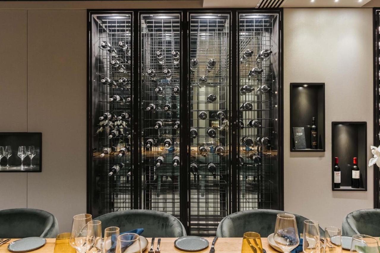 Peppers Waymouth Hotel Adelaide Exteriör bild Wine display at the restaurant