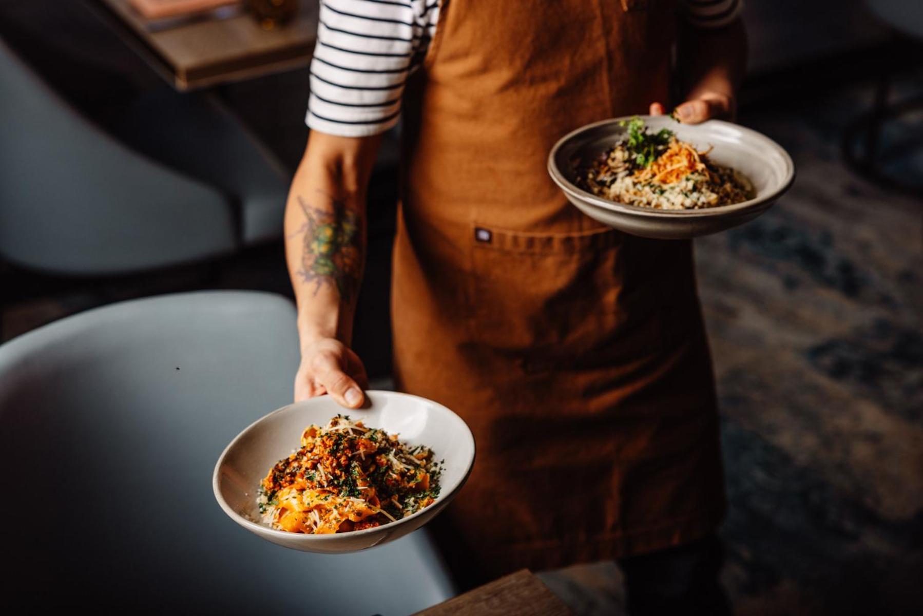Peppers Waymouth Hotel Adelaide Exteriör bild Dishes at the restaurant